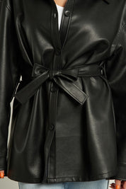 Lyra Faux Leather Jacket featuring a belted waist and chic faux leather finish, perfect for stylish layering.
