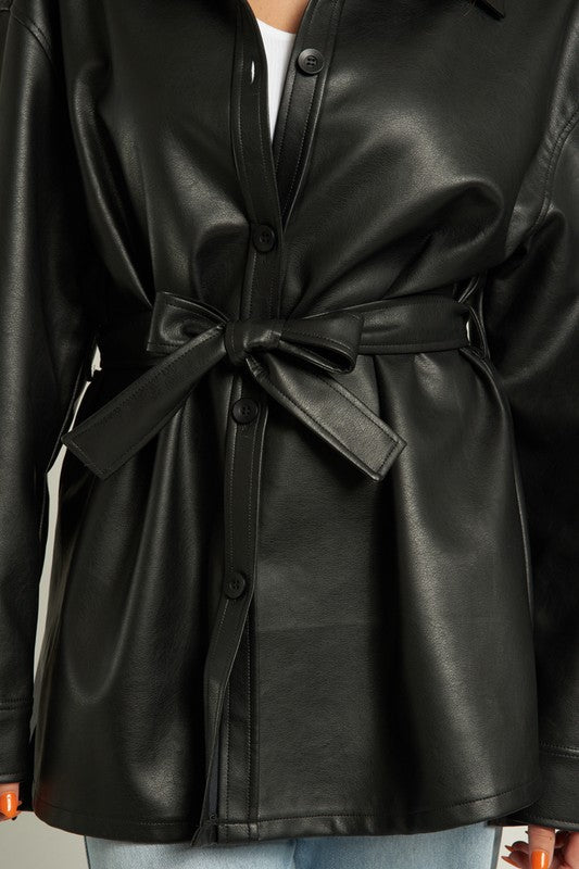 Lyra Faux Leather Jacket featuring a belted waist and chic faux leather finish, perfect for stylish layering.