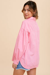 Tina Cotton ShirtIntroducing our Statement Sleeve Poplin Button Down, a versatile addition to your wardrobe. Crafted from a premium cotton blend, this shirt offers a perfect balance of comfort and style. The standout feature of this piece is its statement