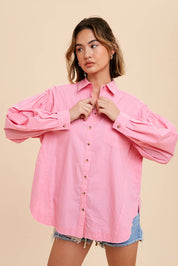 Tina Cotton ShirtIntroducing our Statement Sleeve Poplin Button Down, a versatile addition to your wardrobe. Crafted from a premium cotton blend, this shirt offers a perfect balance of comfort and style. The standout feature of this piece is its statement