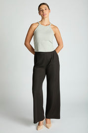 Harbor Waffle Trouser paired with a stylish cropped top, featuring a relaxed bootcut silhouette and comfortable fit.