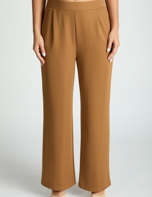 Stylish woman wearing Harbor Waffle Trouser, showcasing comfortable waffle trousers for women in a polished bootcut design.