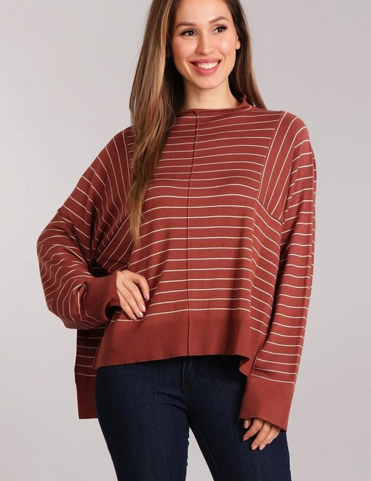 Aubrey Knit Pullover in rust with white stripes, featuring a mock neck and oversized fit, perfect for casual layering.