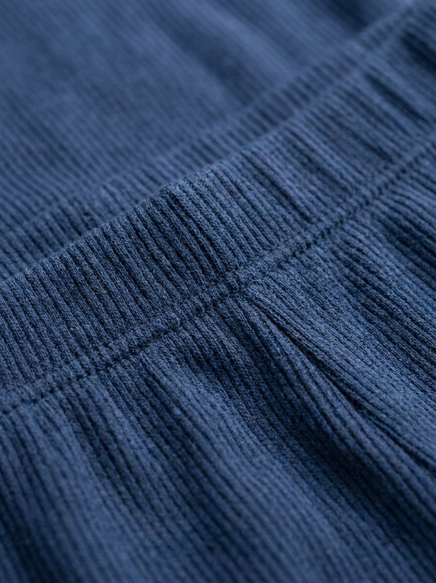 Two-piece lounge set — Fabric Detail Macro | Generated by Modelize