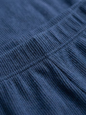 Two-piece lounge set — Fabric Detail Macro | Generated by Modelize