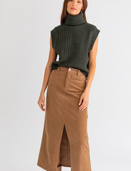 Ginni Midi Skirt - FINAL SALEFeaturing a high rise waist, midi length skirt with front slit. Soft corduroy fabric. SIZE & FIT Fit: This garment fits true to size.Fabric: Non Stretch FabricLength: Size S measures ** MODEL INFO 5'8" & wearing size Small Dis