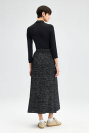 Glitter Maxi Skirt - FINAL SALEAdd a touch of sparkle to your winter wardrobe! This maxi skirt is made of a soft knit fabric, and features an elastic waist SIZE & FIT Fit: This garment fits true to size.Fabric: Stretch FabricLength: Size S measures 37" MO