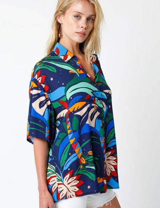 Kaylani Half Sleeve Top - FINAL SALEWith a fun print and a loose, easy fit, the Kaylani Top is the perfect summer blouse! The lightweight fabric keeps you cool, and with so many ways to style, its sure to be a go to! Dress this piece up with your favorite