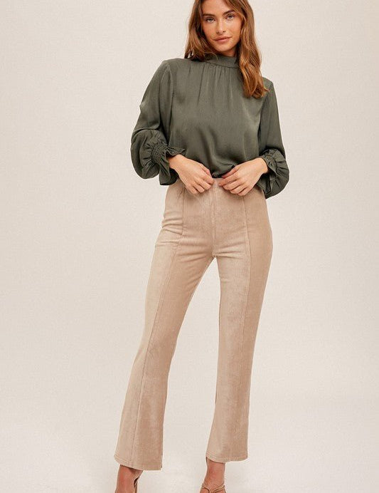 Raven Split Hem PantThe perfect blend of trendy and comfy. Made of a soft brushed corduroy fabric, these pants feature a high rise elastic waist. With plenty of stretch to keep you comfy throughout the day, you'll never want to take them off! Featuring a