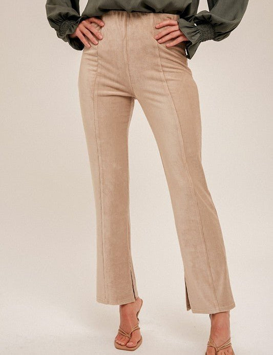 Raven Split Hem PantThe perfect blend of trendy and comfy. Made of a soft brushed corduroy fabric, these pants feature a high rise elastic waist. With plenty of stretch to keep you comfy throughout the day, you'll never want to take them off! Featuring a