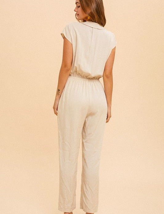 Shona Collared JumpsuitPRODUCT DESCRIPTION: Live easy in the Shona Collared Jumpsuit. Made of a lightweight woven fabric, this jumpsuit is the perfect thing to take you from brunch to errands and everything in between. Features a straight leg fit, elastic